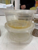 plastic container containing predator Aphytis melinus