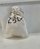 small fabric bag containing Rhyzobius