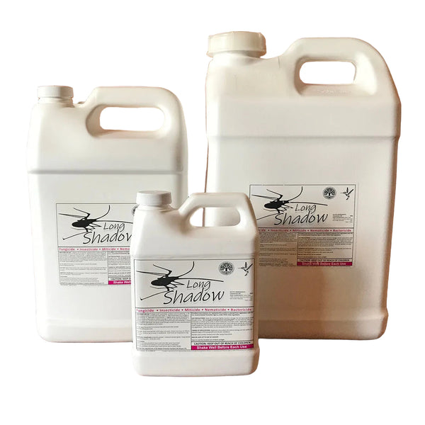 Three white plastic jugs of Long Shadow insecticide in different sizes 