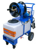 A Dramm MSO high-pressure hose washer and pressure washer cart on a white background. The cart features a blue frame, a white tank with an orange Dramm logo stripe, a large black hose reel with blue hose, and black wheels.